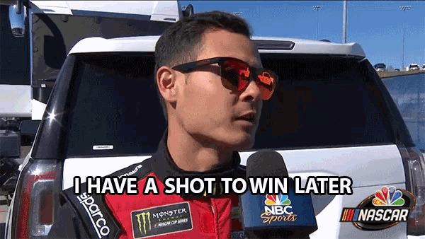 a man wearing sunglasses says i have a shot to win later in front of a white car