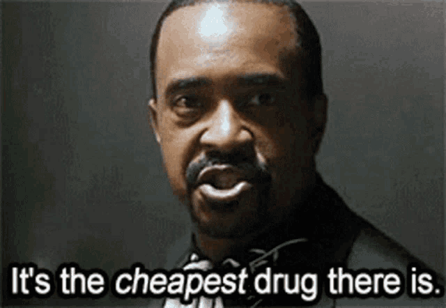 a man with a beard is saying `` it 's the cheapest drug there is . ''