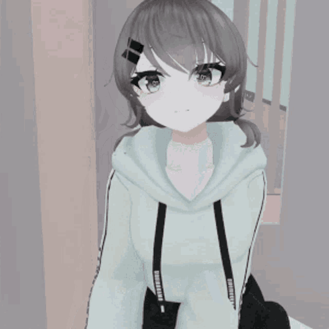 a girl with green eyes is wearing a hoodie with a zipper