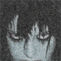 a close up of a person 's face with a blurred background