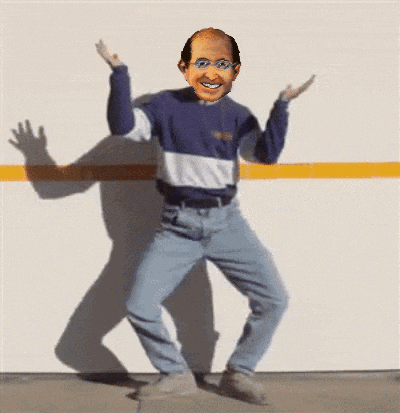 a man with glasses and a bald head is dancing on the sidewalk