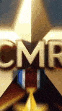 a close up of the cmr logo on a star