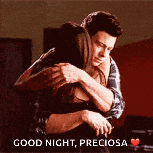a man is hugging a woman with the words " good night preciosa " written on the bottom