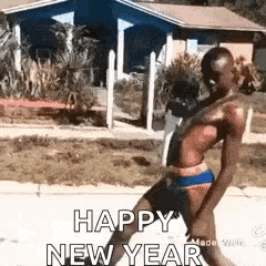 a man in a bikini is dancing in front of a house and says `` happy new year '' .