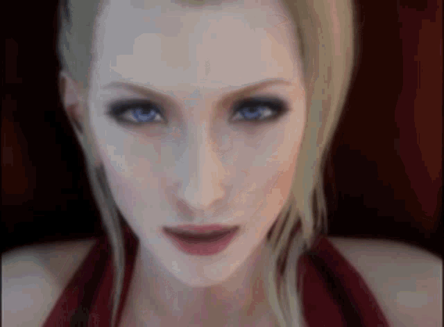 a close up of a woman 's face with blonde hair and blue eyes