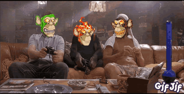 a gif of three monkeys sitting on a couch