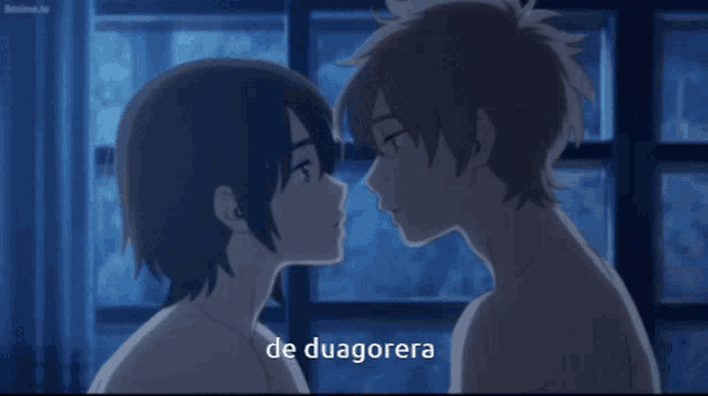 a couple kissing with the words de duagorera written below them