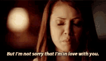 a woman is saying `` but i 'm not sorry that i 'm in love with you '' .