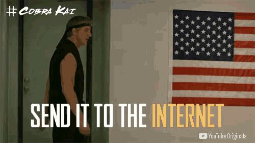 a man standing in front of an american flag with the words send it to the internet
