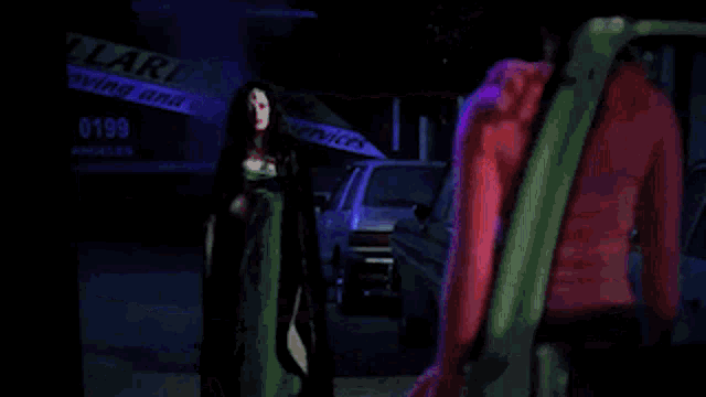 a woman in a red jacket is standing in front of a billard moving and loading sign