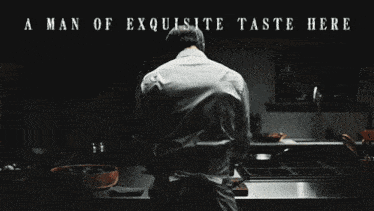 a man in a kitchen with the words a man of exquisite taste here below him
