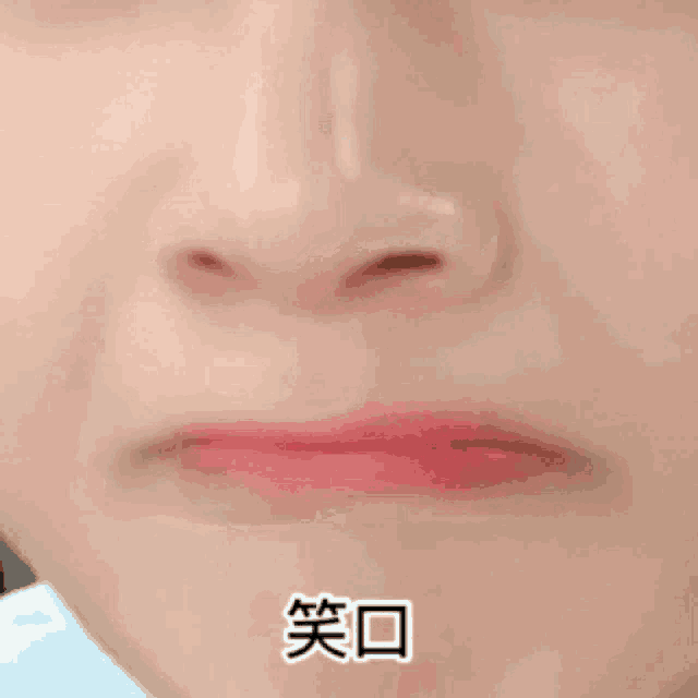 a close up of a person 's mouth with braces on their teeth and red lips .