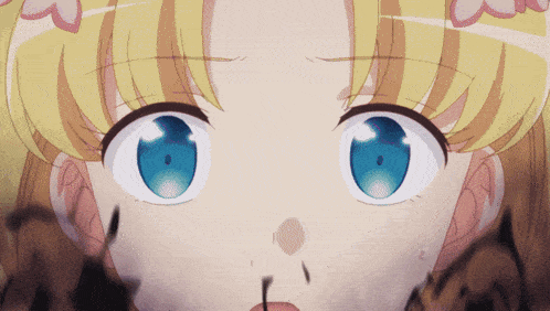 a close up of a girl 's face with blue eyes and yellow hair