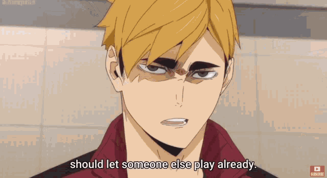 a man in a red shirt is talking about someone else playing already