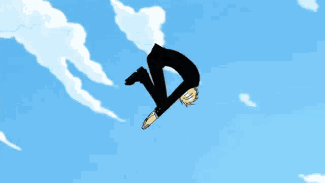 a man in a black suit is running in front of a castle wall