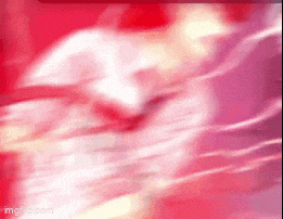 a red and white background with a blurred image of a person 's face