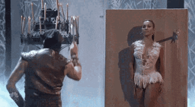 Magicianassistant Knifethrower GIF - Magicianassistant Knifethrower Knifethwrowing GIFs