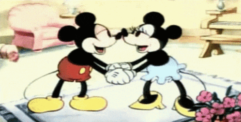 mickey mouse and minnie mouse are kissing in a cartoon