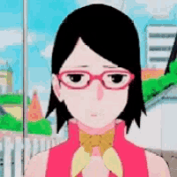 a girl wearing glasses and a red shirt is standing in front of a window .