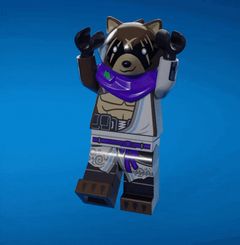 a lego figure of a raccoon with a purple scarf around its neck
