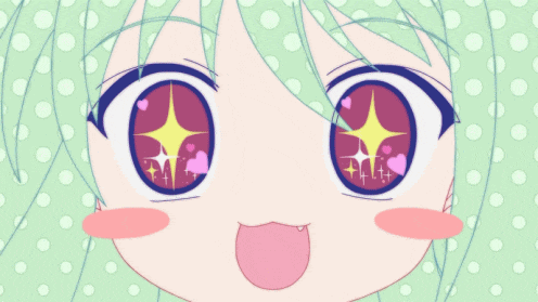 a close up of a girl 's eyes with hearts and stars in them