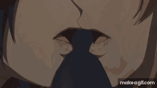 a close up of a couple kissing with the words make a gif.com at the bottom