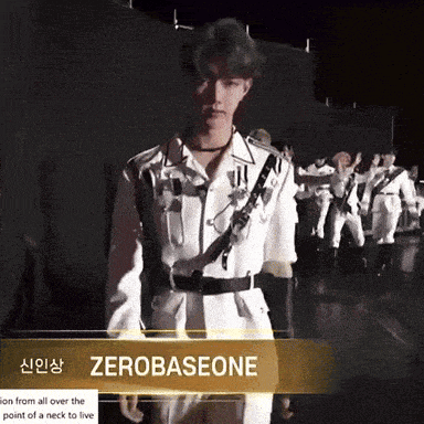 a man in a white uniform with the name zerobaseone