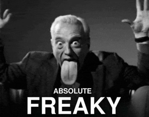 a black and white photo of a man sticking out his tongue with the words absolute freaky behind him