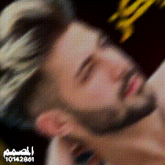 a man with a beard wearing a hat with the number 10142861 on the bottom