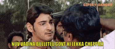 a man with a gun pointing at another man with the words nuv vadina bulletlu govt ki lekka cheppali
