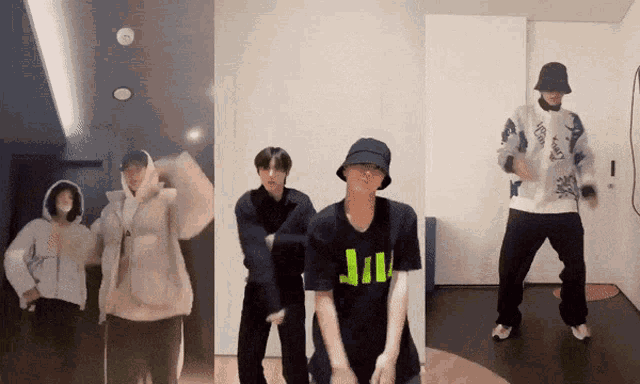 a group of young men are dancing in a room and one of them is wearing a shirt that says jill