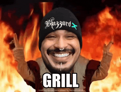 a man with a beard wearing a black beanie that says blazzard on it
