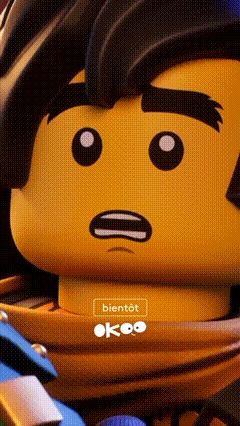 a close up of a lego character 's face with a surprised expression .