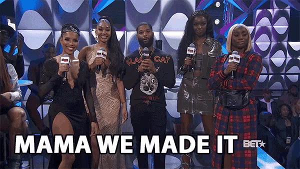 a group of people are standing in front of microphones with the words mama we made it written on the bottom
