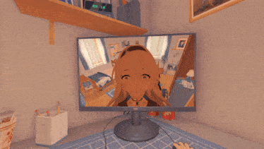a picture of a person laying on their back in front of a computer screen