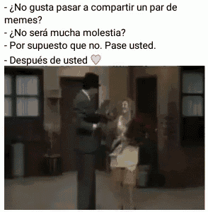 a man in a suit is standing next to a woman in a dress and talking to her .