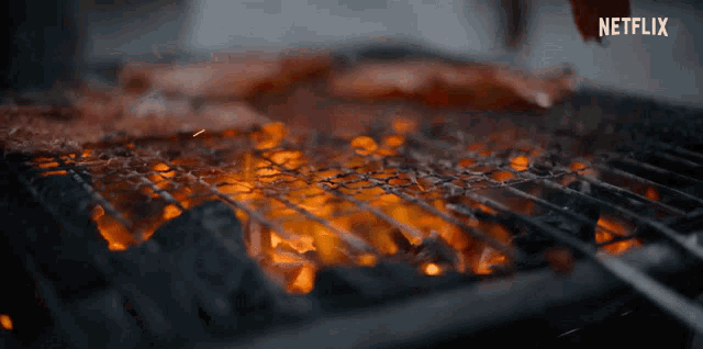 a close up of a grill with netflix written in the corner