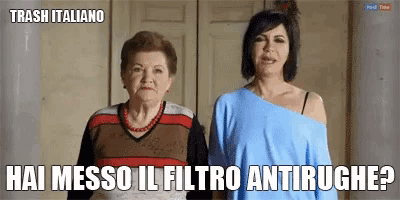 two women are standing next to each other and the caption says trash italiano hai messo il filtro antirughe