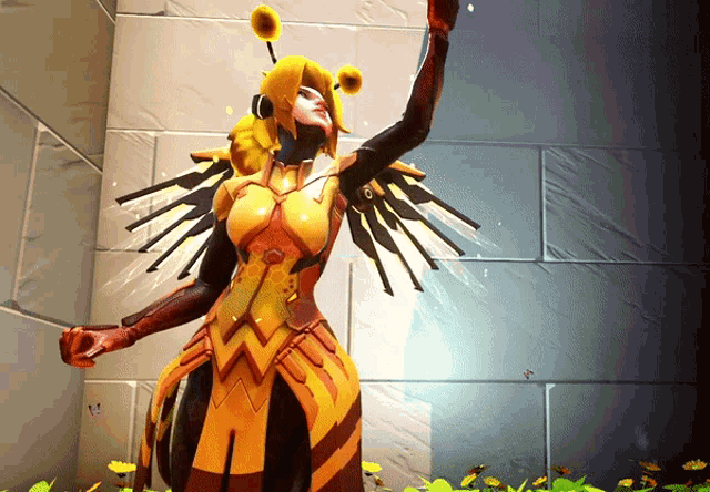 a woman in a bee outfit is standing in front of a brick wall