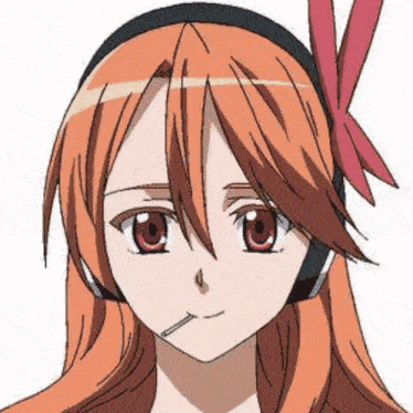 a close up of a girl 's face wearing headphones and a bow in her hair .