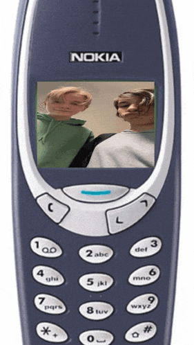 a nokia cell phone with two people on the screen
