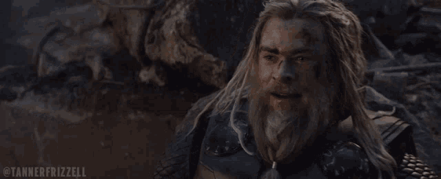 a man with long hair and a beard is saying i knew it
