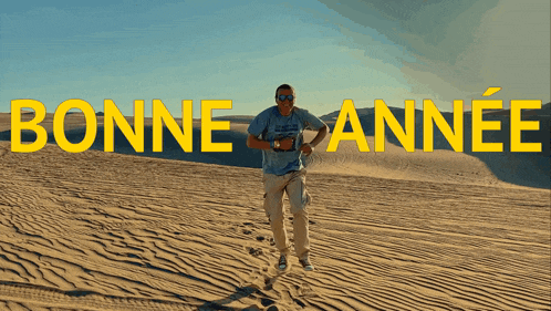 a man is running in the desert with the words bonne annee written in yellow