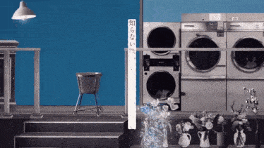 a laundromat with a blue wall and a sign that says ' i 'm not sure ' on it