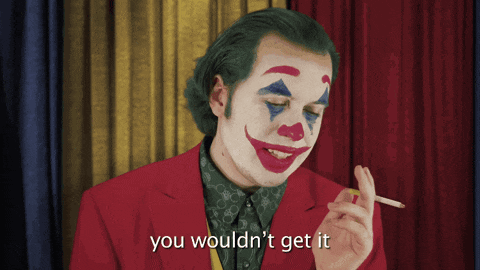 a man dressed as the joker smoking a cigarette and saying you wouldn 't get it