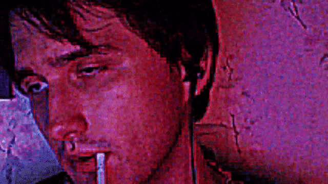a blurry picture of a person wearing earbuds
