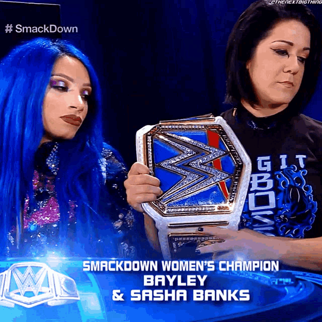 a woman with blue hair is holding a smackdown women 's champion trophy