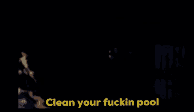 a man with a beard is standing in the dark with the words `` clean your fuckin pool '' written above him .