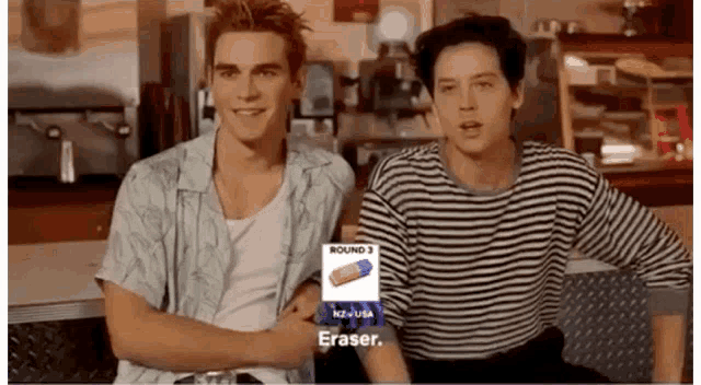 two young men are sitting next to each other in a diner and one of them is wearing a rubber eraser