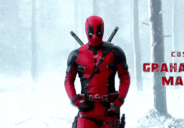 a man in a deadpool costume is standing in a forest